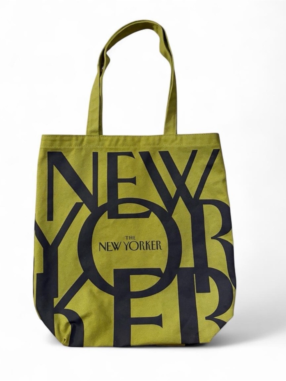 The New Yorker canvas tote bag with black logo on olive green background